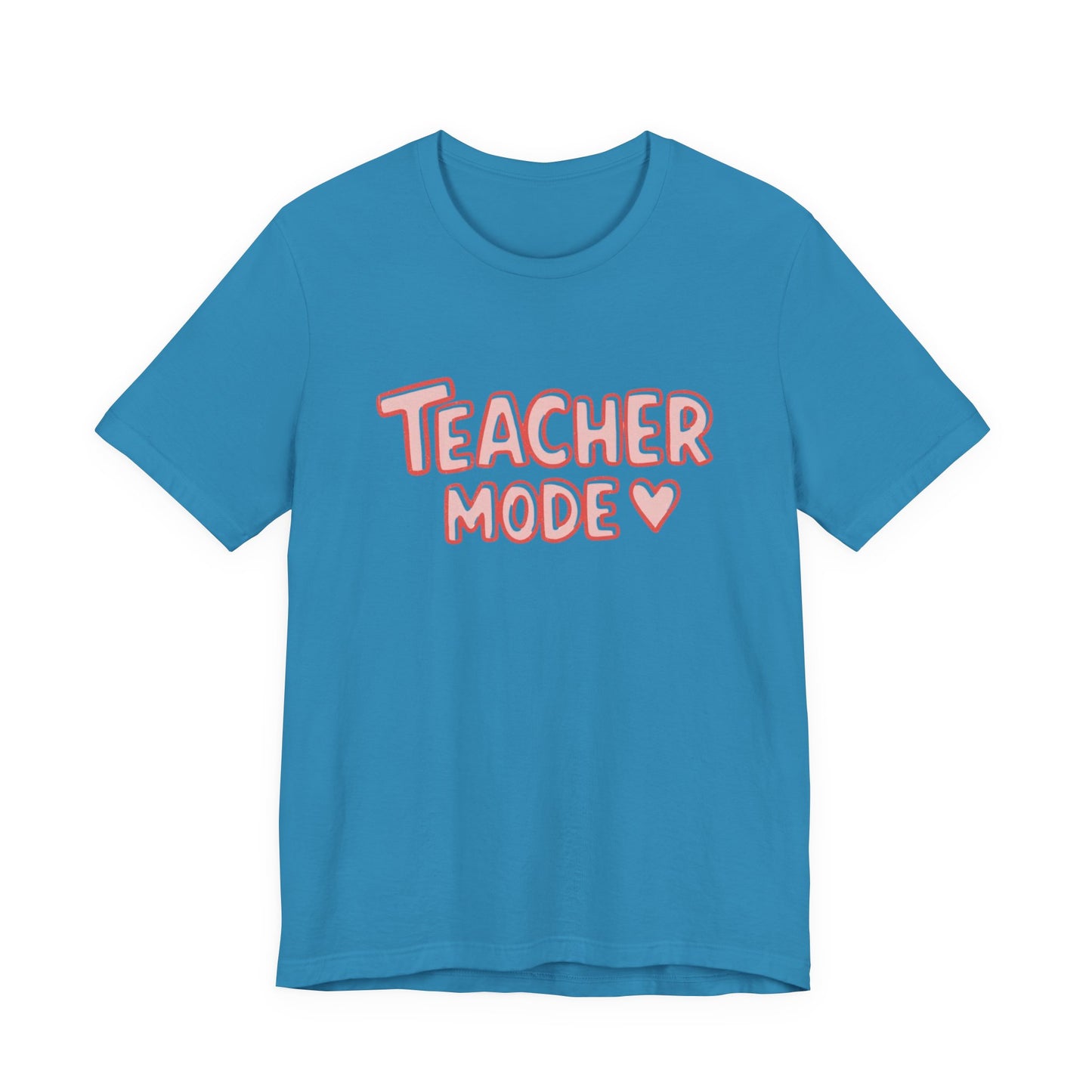 Blue t-shirt with 'Teacher Mode' text in pink on a white background