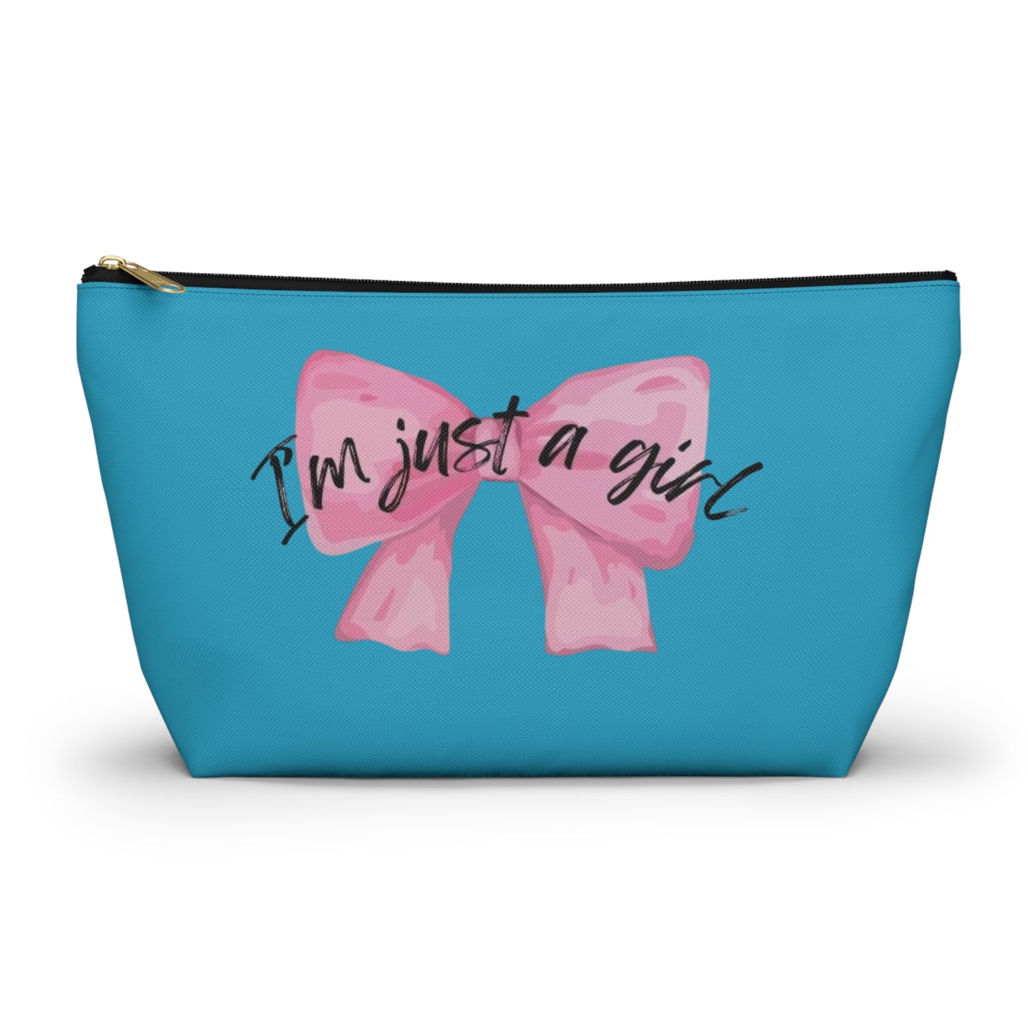 A cosmetic case with a blue background and a pink bow with the text 'I'm just a girl' on it.