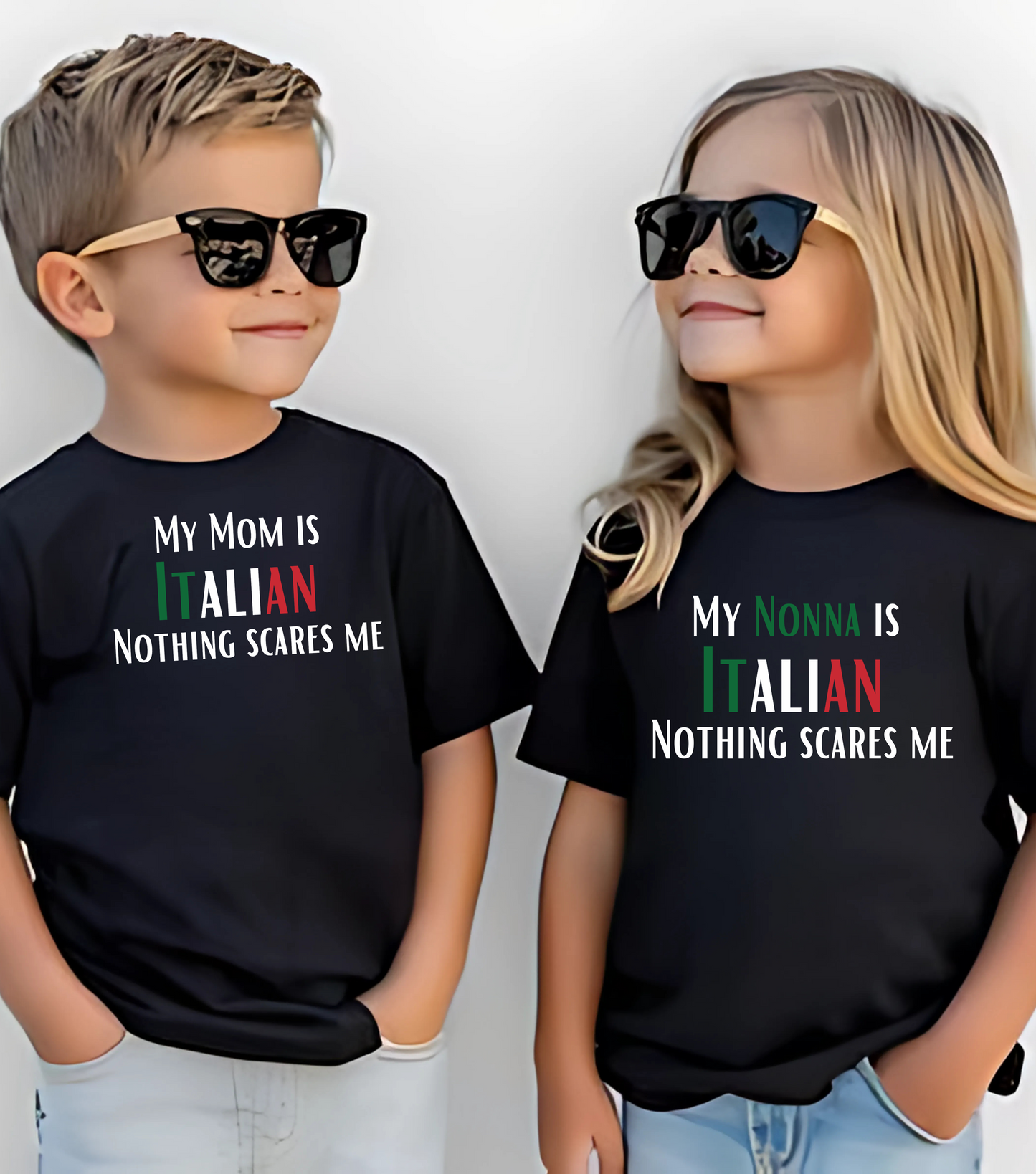 Two children wearing black t-shirts with Italian-themed text, standing against a plain background.