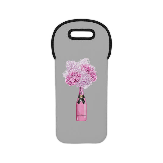 A gray neoprene tote bag with a floral design, specifically designed as a wine bottle holder.